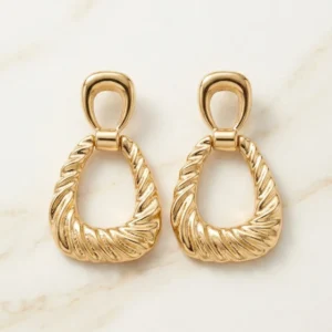 Gilded Teardrop Ribbed Statement Earrings